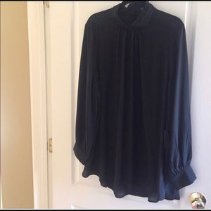 Black sheer turtleneck top.